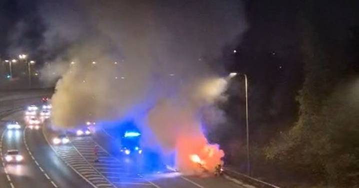 Traffic stopped on M60 and emergency services on scene as van engulfed by flames
