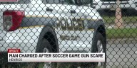 Man charged after soccer game gun scare