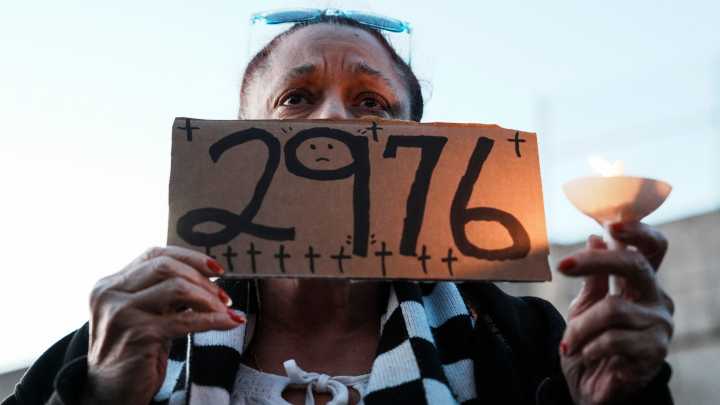 See photos from a candlelight vigil for victims of UPS flight 2976