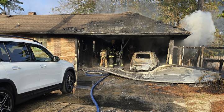 Morning house fire under investigation after ‘heavy flames’ damage carport of home
