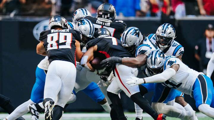 On a day of explosive offense, Panthers' defense stabilized in the second half