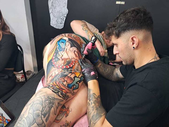 Tatuadores y tatuados en el Centro de Exposiciones y Congresos