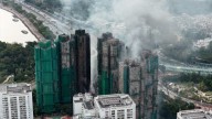 Cronología del incendio en Hong Kong que obligó a evacuar a cientos