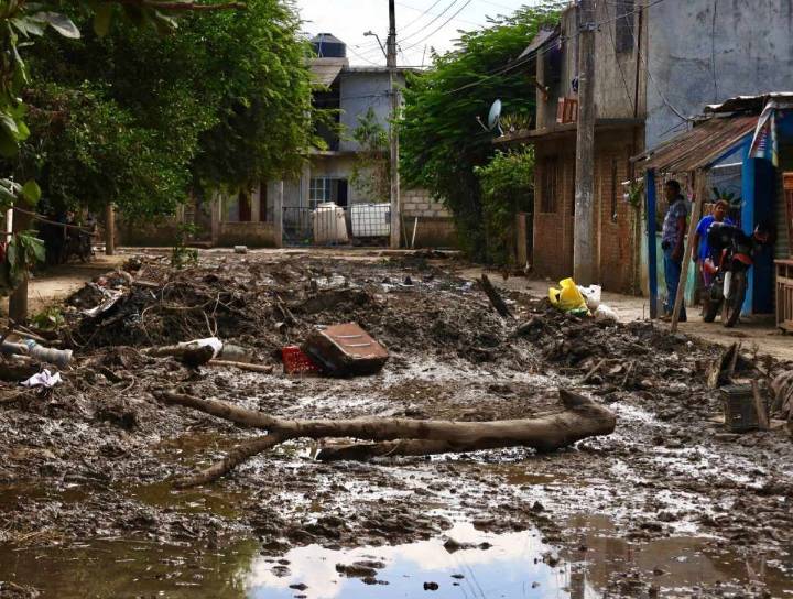 Buscan reconstruir sus vidas en Álamo, Veracruz, pese a estragos por inundaciones y violencia