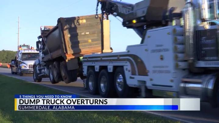 Driver rescued after dump truck crash in Summerdale