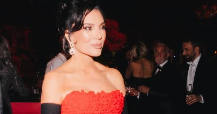 Kris Jenner Turns Heads in Strapless Red Dress