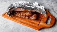 The Aluminum Foil Mistake That's Ruining The Crust On Your Steak