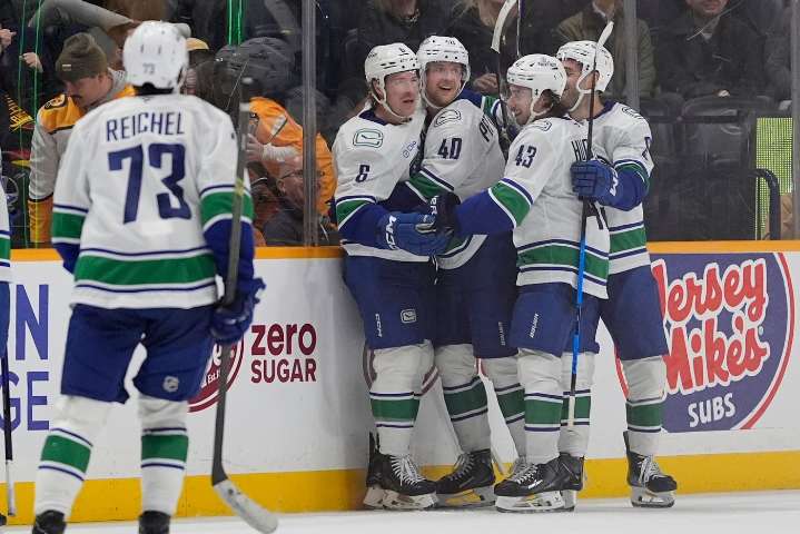 Boeser scores late OT winner as Canucks beat pesky Predators 5