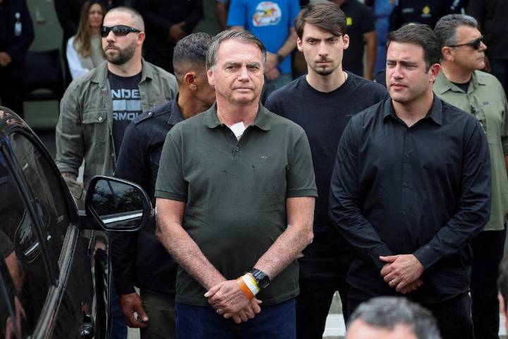 Brazil’s Bolsonaro ordered to begin 27-year prison sentence for coup plot