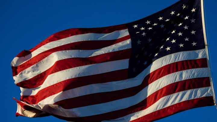 Why are flags at half-staff in Colorado?