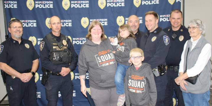 Child battling leukemia named honorary McPherson police officer
