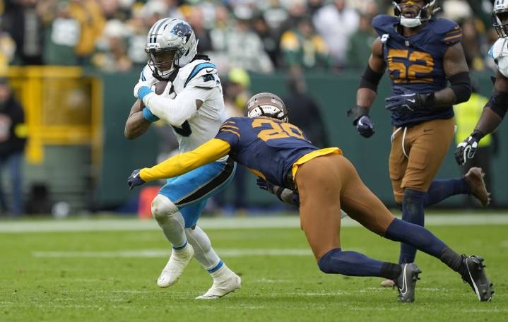 Deadspin | Rico Dowdle, opportunistic Panthers upset Packers