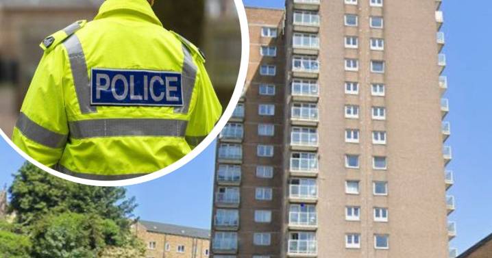 Man, 25, airlifted to hospital after 'falling from block of flats' as police make assault arrest