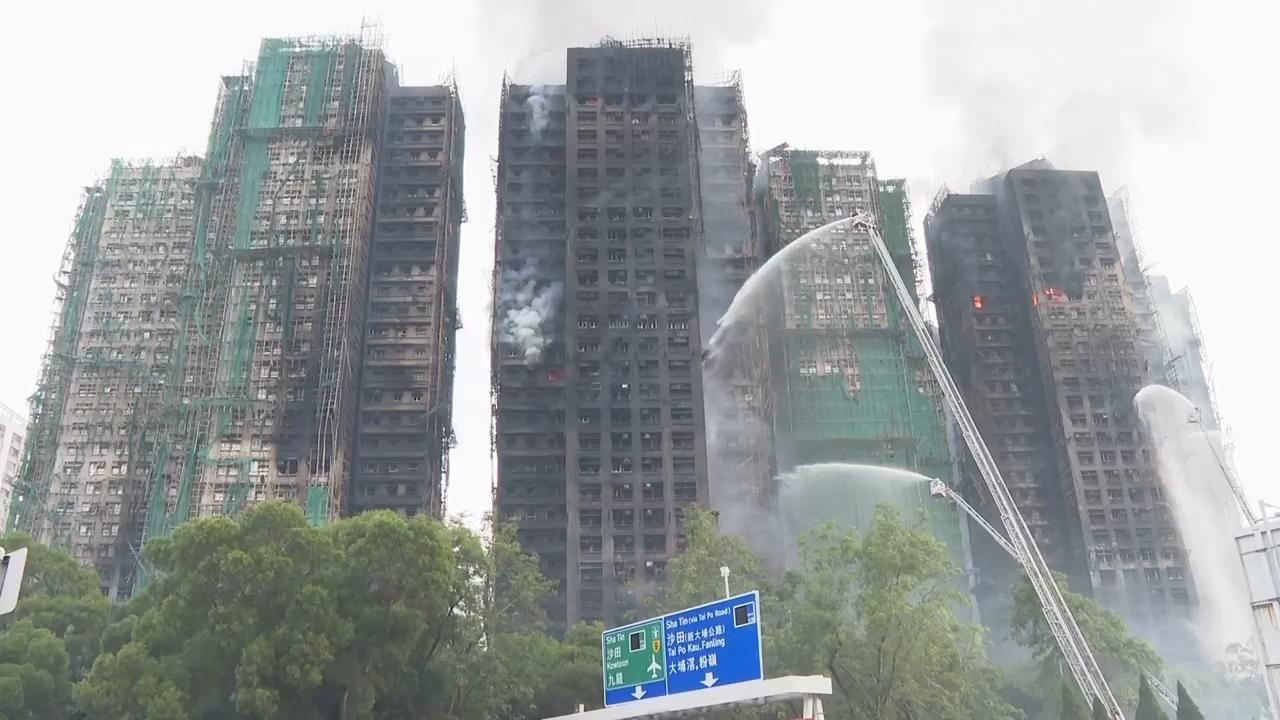 Death toll rises in Hong Kong fire as 8 more arrested over towers' renovation