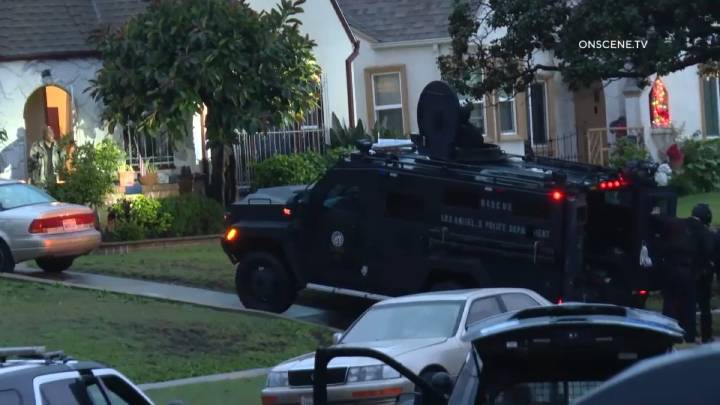 Police shoot a suspect accused of firing weapon at LAPD helicopter