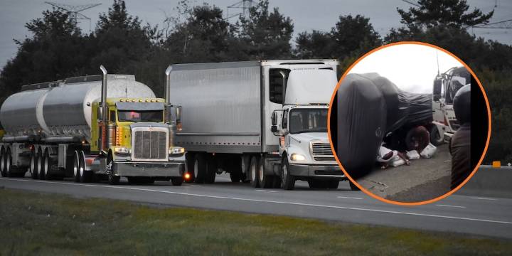 En video: Tractomula volcada en la vía a Buenaventura fue saqueada mientras su conductor herido esperaba por atención a un lado de la vía