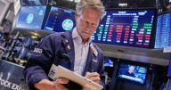 Wall Street gains ground amid steady flow of earnings reports, upbeat economic updates