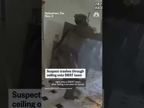 Suspect crashes through ceiling onto waiting SWAT team