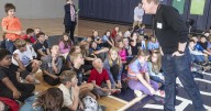 More than 700 Warrior Run Elementary students meet with muralist about upcoming spring project