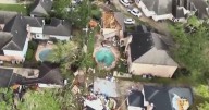 Massive funnel cloud slams Houston suburbs, leaving widespread damage