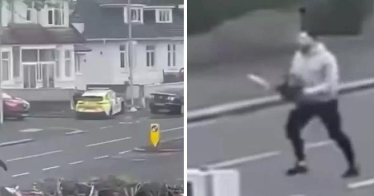Chilling footage shows chainsaw thug chasing police officer down street