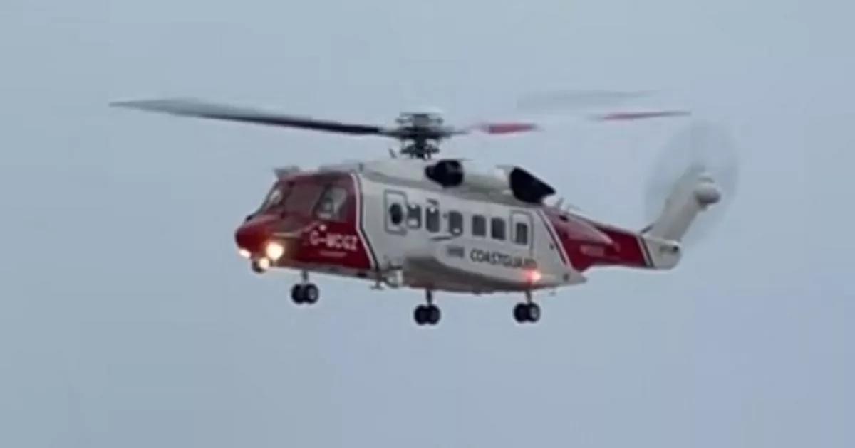 People airlifted to safety by coastguard after getting in trouble in water