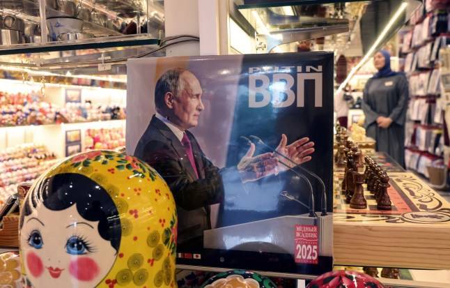 Putin shows off his judo and piano skills in bizarre new calendar for 2026