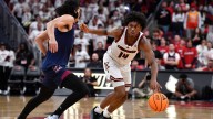 Rooths scores 20 as No. 11 Louisville scorches South Carolina State, 104