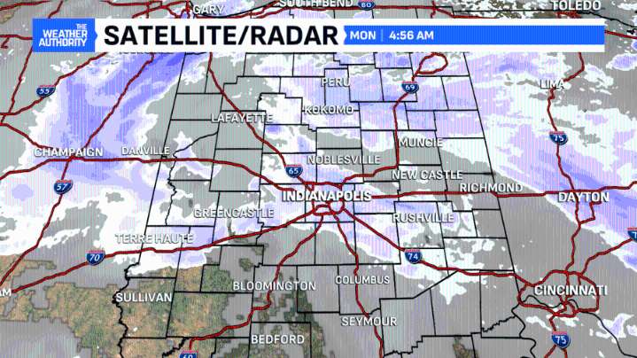 Snow ending around lunch; cold eases midweek