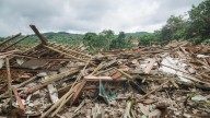 At least two killed, 21 missing after massive landslide in Indonesia