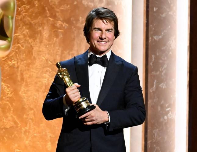 Tom Cruise celebrates his first Oscar win on the dancefloor