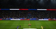 Players and fans remember victims of 2015 Paris terror attacks before France