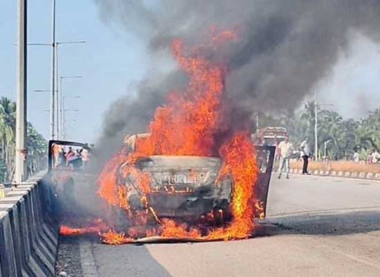 Byndoor: Moving car catches fire on flyover; passengers escape unhurt