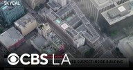 Police search for armed suspect in downtown Los Angeles high