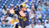Brewers decline Danny Jansen option, Brandon Woodruff opts out