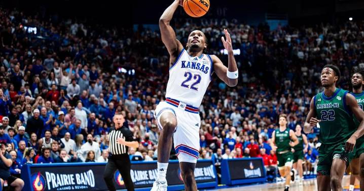 Peterson scores 21 points in debut, No. 19 Kansas routs Green Bay 94