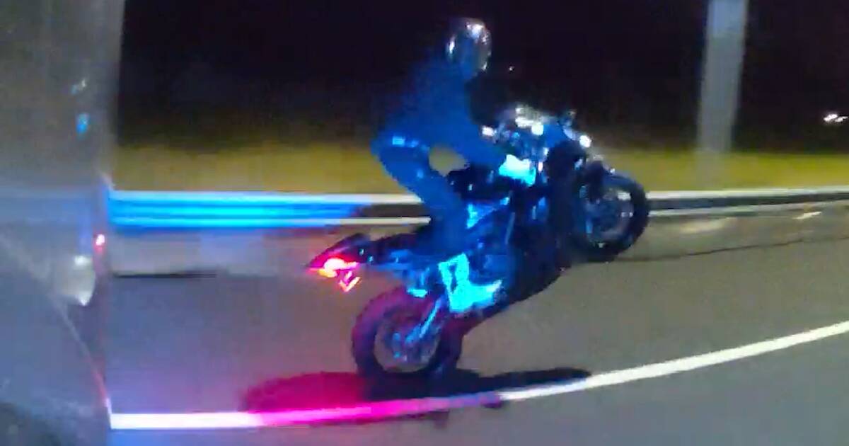 Biker's licence suspended after highway wheelie next to police officer