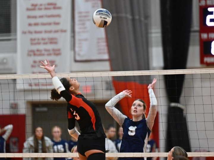Homer girls volleyball holds off 3-time defending