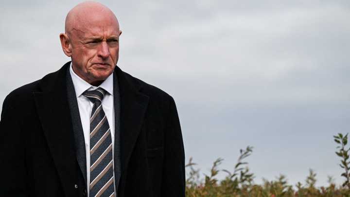 'I will not be intimidated,' Sen. Mark Kelly says of Trump's threats