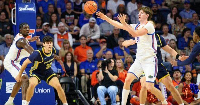 No. 10 Florida rolls Merrimack 80-45 as world's tallest teen scores first collegiate point