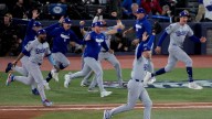 Smith's homer in 11th lifts Dodgers over Blue Jays 5-4 to become first repeat champion in 25 years