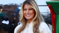 Melania Trump looks festive as she welcomes 2025 White House Christmas tree
