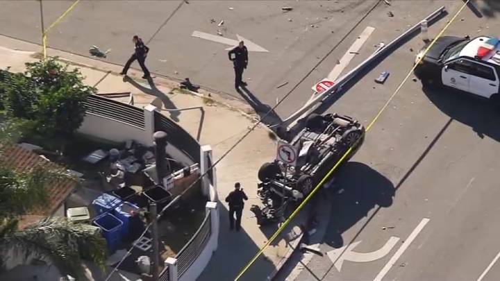 Car crashes into power pole and overturns in Van Nuys