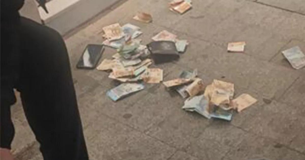 'Street thief' who punched woman tracked down from trail of banknotes