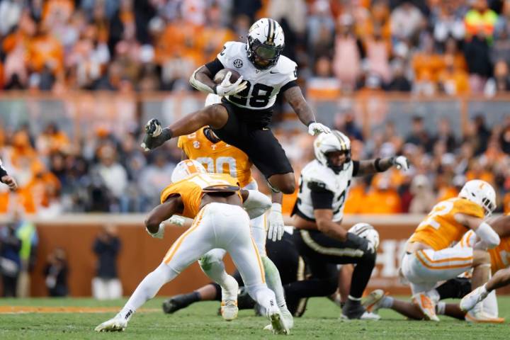 Pavia passes, runs for TDs as No. 12 Vanderbilt beats in-state rival No. 18 Tennessee 45