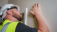 Fix Cracks In Your Wall Once And For All With A Screw Hack