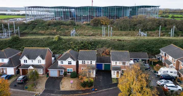 Residents fuming as 'monstrosity' warehouse built near homes