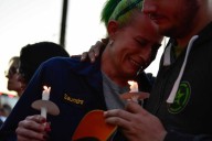 Mourners hold candlelight vigil for Louisville UPS plane crash victims