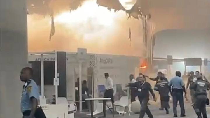 Fire prompts evacuations at U.N. climate talks in Brazil; 13 suffer smoke inhalation