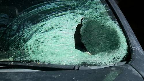 Man injured by frozen water balloon thrown through windshield
